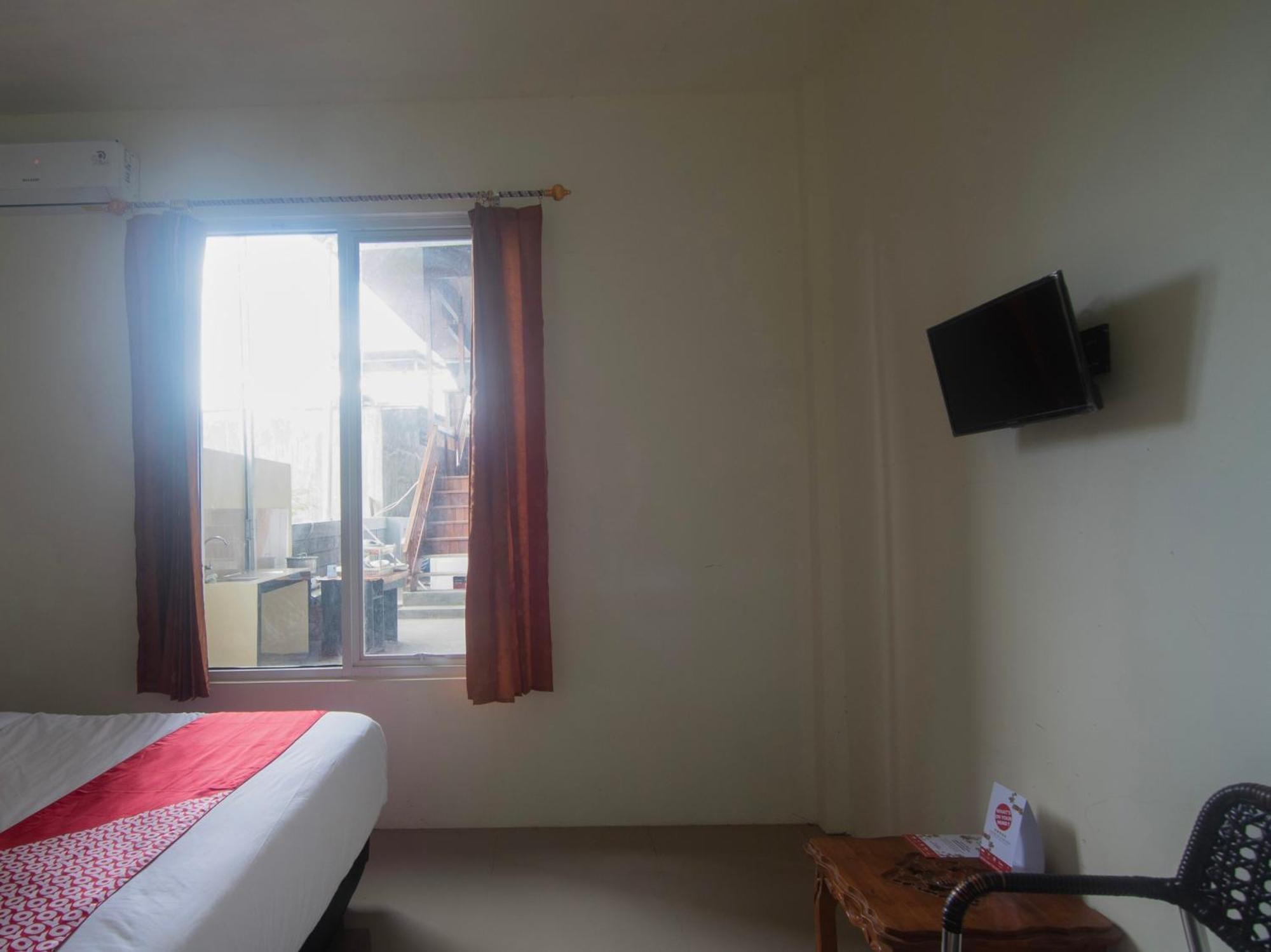 Oyo 92714 Miracle Kost Manado